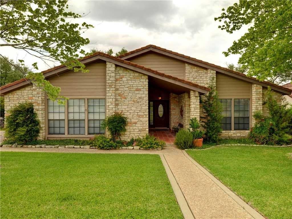 View 21 Stillmeadow Dr in HILLS OF LAKEWAY PHS 1 THE 21 Stillmeadow Dr - front exterior - Luxury home in HILLS OF LAKEWAY PHS 1 THE, Austin, TX