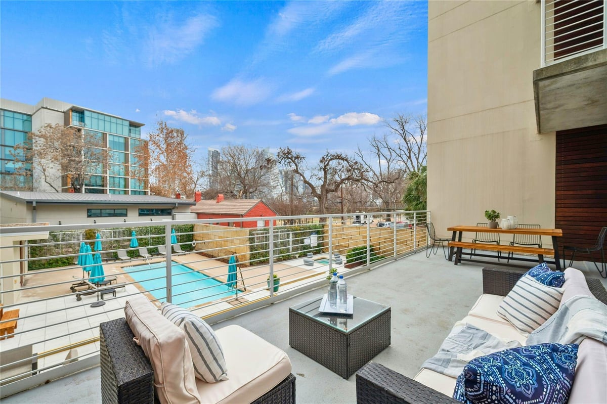View 210 Lee Barton DR Unit #205 in Bridges On The Park Amd 210 Lee Barton DR Unit #205 - front exterior - Luxury home in Bridges On The Park Amd, Austin, TX