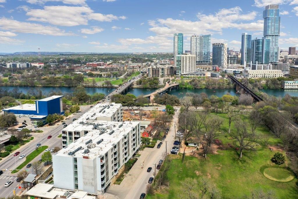 View 210 Lee Barton DR Unit #208 in Bridges On The Park Amd 210 Lee Barton DR Unit #208 - front exterior - Luxury home in Bridges On The Park Amd, Austin, TX
