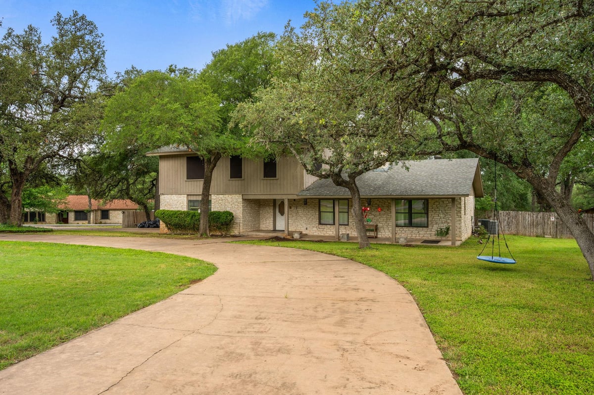 View 210 Waxwing DR in Leisurewoods Sec 2 210 Waxwing DR - front exterior - Luxury home in Leisurewoods Sec 2, Buda, TX