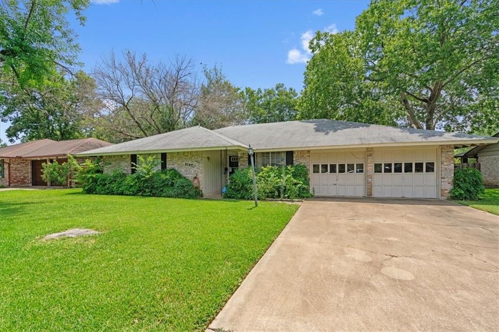View 2107 Kenbridge Dr in Allandale North 2107 Kenbridge Dr - front exterior - Luxury home in Allandale North, Austin, TX