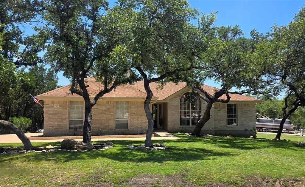 21105 Newport CV - front exterior - Luxury home in Highland Lake Estates Sec 32, Lago Vista, TX