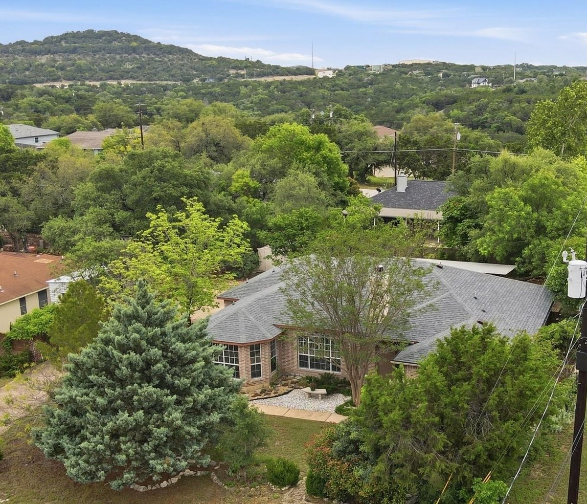 View 21142 Northland DR in Lago Vista Estates Sec 05 21142 Northland DR - front exterior - Luxury home in Lago Vista Estates Sec 05, Lago Vista, TX