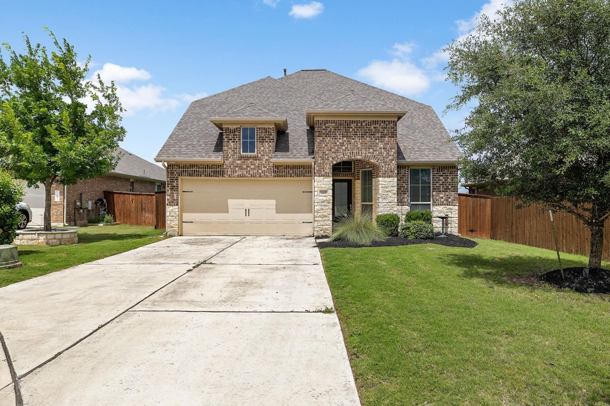 View 212 Estima CT in Santa Rita Ranch Ph 1 Sec 2B 212 Estima CT - front exterior - Luxury home in Santa Rita Ranch Ph 1 Sec 2B, Liberty Hill, TX