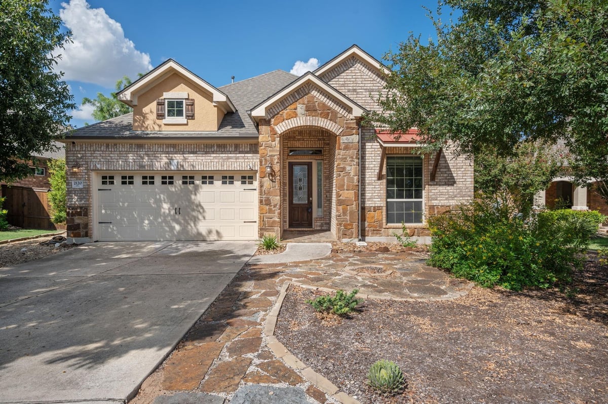 View 2120 Williston Loop in Bridges Of Bear Creek Ph 2 Se 2120 Williston Loop - front exterior - Luxury home in Bridges Of Bear Creek Ph 2 Se, Austin, TX