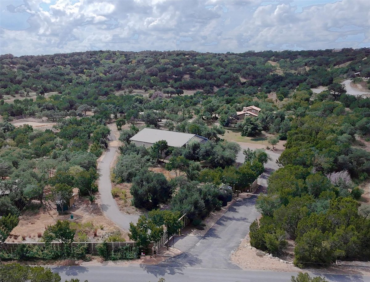 21201 Kathy Ln - front exterior - Luxury home in BEATY SEALE & FORWOOD, Spicewood, TX