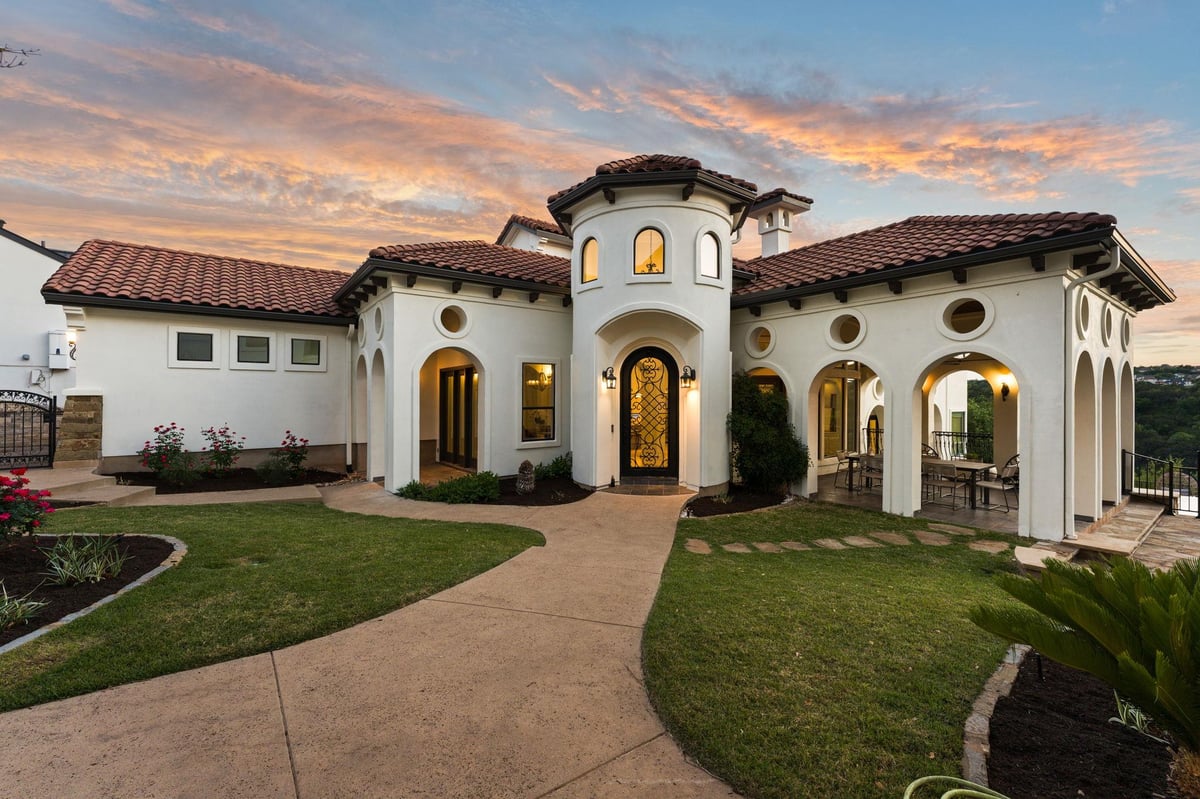 View 2121 Sea Eagle Vw in Lake Pointe Sec 07 2121 Sea Eagle Vw - front exterior with Spanish-style facade - Luxury home in Lake Pointe Sec 07, Austin, TX