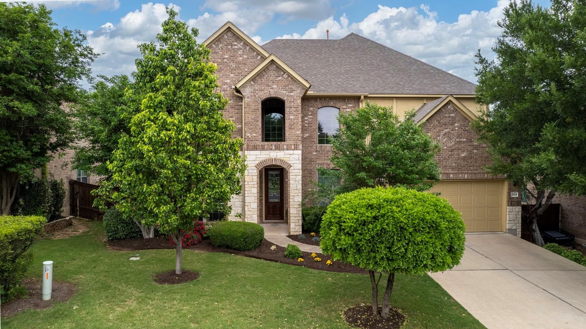 View 2124 Turtle Mountain Bnd in Bridges At Bear Creek Ph 2 SE 2124 Turtle Mountain Bnd - front exterior - Luxury home in Bridges At Bear Creek Ph 2 SE, Austin, TX