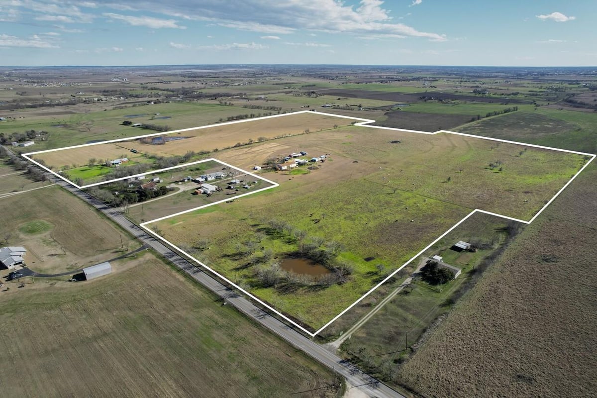 View 21265 Melber Ln in Samuel C Jones 21265 Melber Ln - aerial view with outlined Manor-area land tract - Luxury lot in Samuel C Jones, Manor, TX