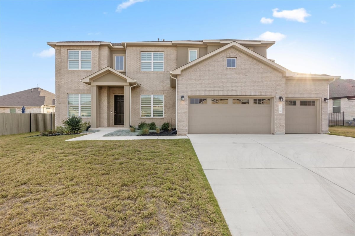 Primary bedroom at 213 Great Lawn Bnd - 5 bed 3 bath home