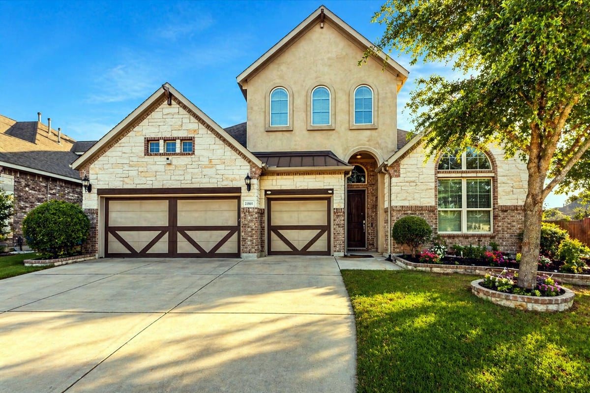 View 21301 Resource Rd in Commons At Rowe Lane Ph Iv A 21301 Resource Rd - front exterior - Luxury home in Commons At Rowe Lane Ph Iv A, Pflugerville, TX