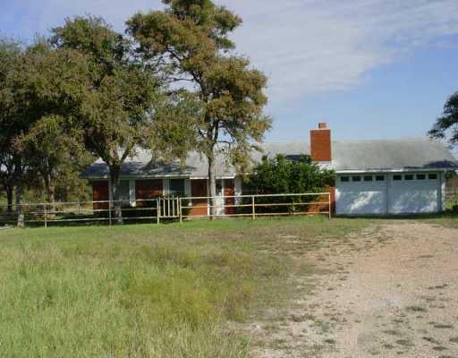 View 21312 Hog Eye RD 21312 Hog Eye RD - property photo 1 - Luxury home in Manor, TX