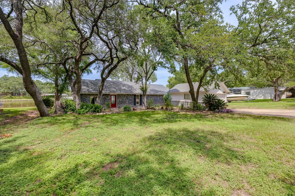 View 214 Island Lodges DR in Island Lodges 214 Island Lodges DR - front exterior - Luxury home in Island Lodges, Buchanan Dam, TX