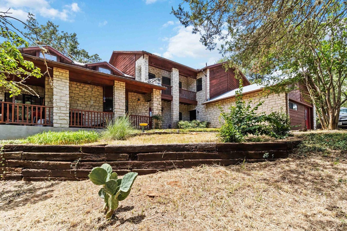 View 214 Laura Ln in Piney Ridge 214 Laura Ln - front exterior - Luxury home in Piney Ridge, Bastrop, TX