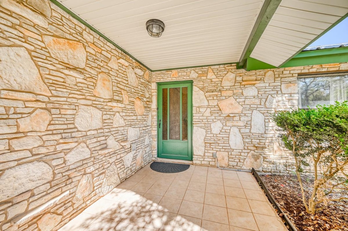 View 21440 FM 306 21440 FM 306 - front exterior - Luxury home in Canyon Lake, TX