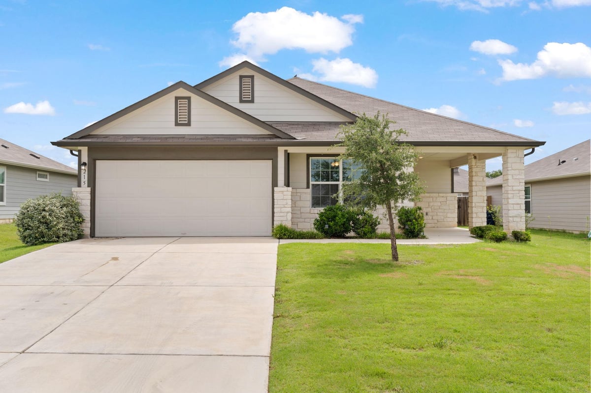 View 215 Bunting LN in Dove Meadow 215 Bunting LN - front exterior - Luxury home in Dove Meadow, Bertram, TX