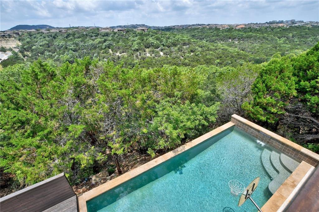 View 215 Rocky Coast Dr in Rough Hollow Sec 5a 215 Rocky Coast Dr - front exterior - Luxury home in Rough Hollow Sec 5a, Austin, TX