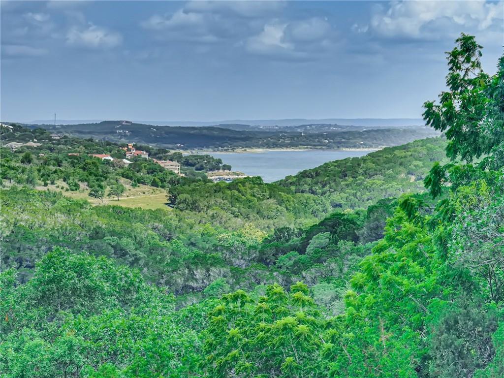 View 215 Woodlands Ct in Rough Hollow 215 Woodlands Ct - front exterior - Luxury home in Rough Hollow, Lakeway, TX