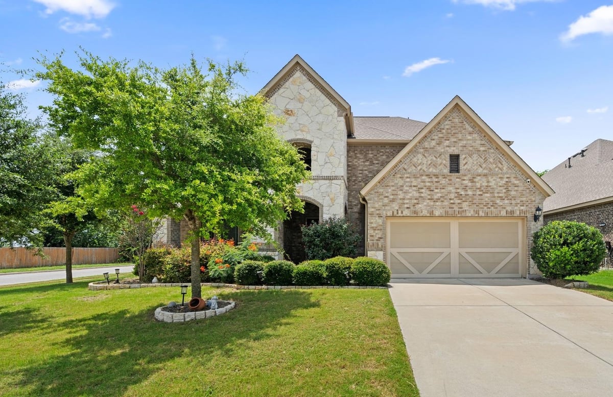 View 21500 Hines LN in The Commons at Rowe Lane 21500 Hines LN - front exterior - Luxury home in The Commons at Rowe Lane, Pflugerville, TX