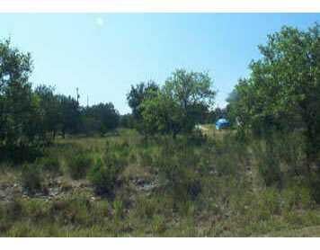 View 21536 Lakefront DR 21536 Lakefront DR - front exterior - Luxury lot in Lago Vista, TX