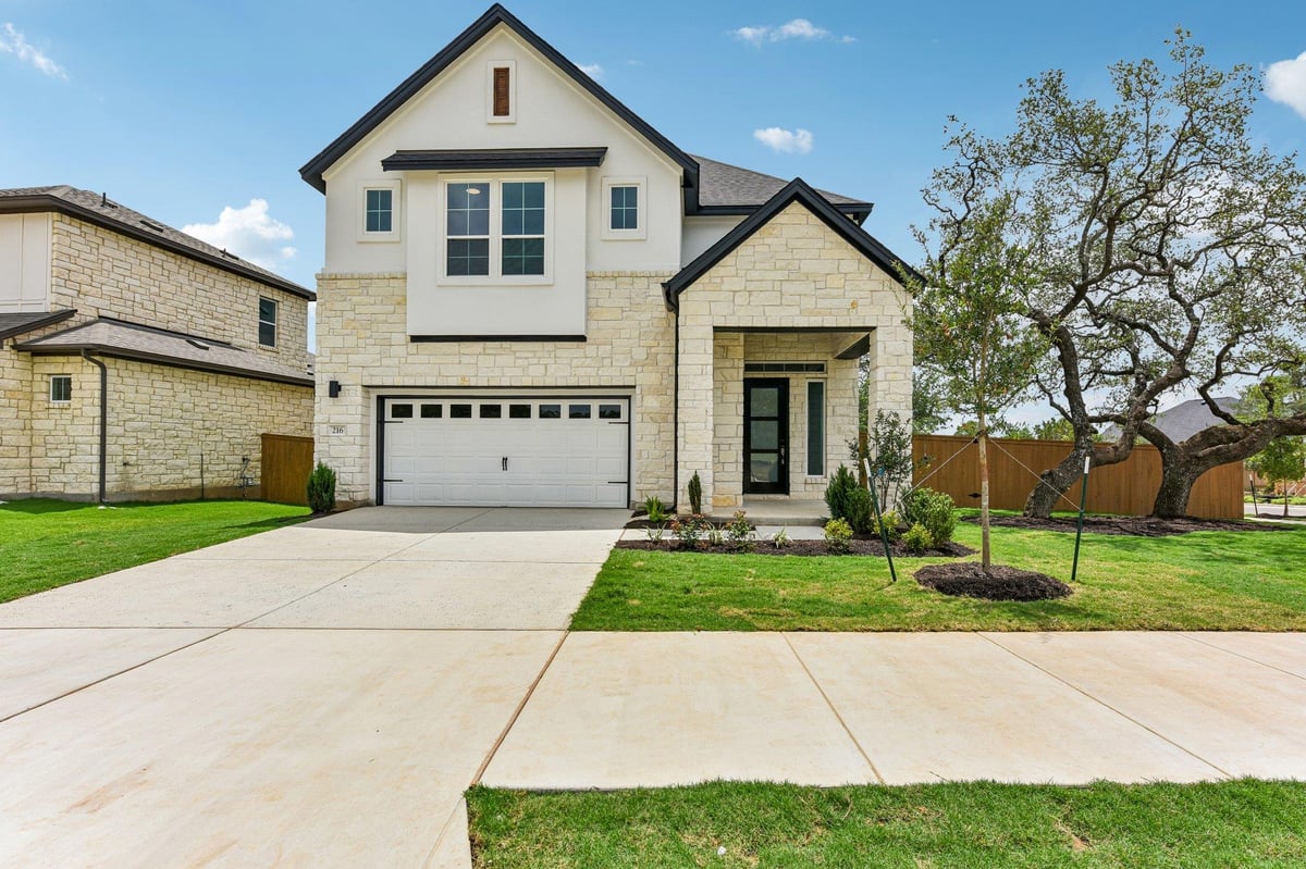 216 Comfort DR - front exterior - Luxury home in Persimmon, Buda, TX