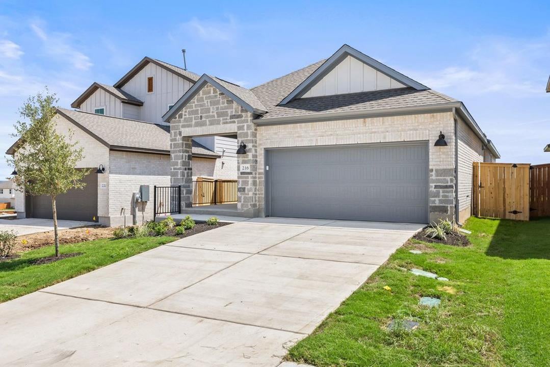 View 216 High Valley Drive in Lariat 216 High Valley Drive - front exterior - Luxury home in Lariat, Liberty Hill, TX