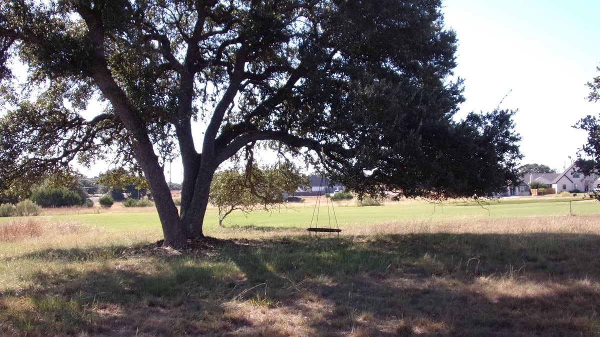 View 216 N Calvin Barrett Dr in ROCKIN J RANCH 216 N Calvin Barrett Dr - front exterior - Luxury lot in ROCKIN J RANCH, Blanco, TX