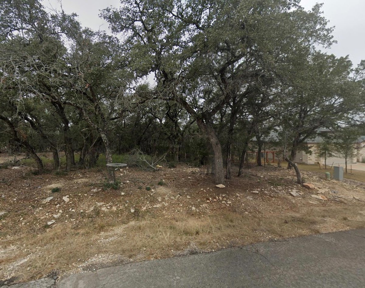 View 21611 Patton DR in Highland Lake Estates Sec 33 21611 Patton DR - front exterior - Luxury lot in Highland Lake Estates Sec 33, Lago Vista, TX