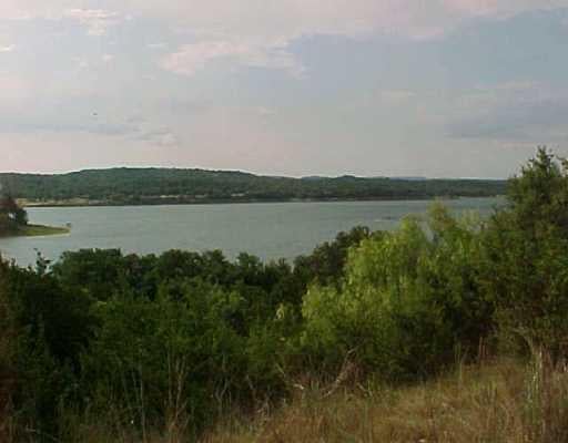 View 21627 High Dr 21627 High Dr - front exterior - Luxury lot in Lago Vista, TX