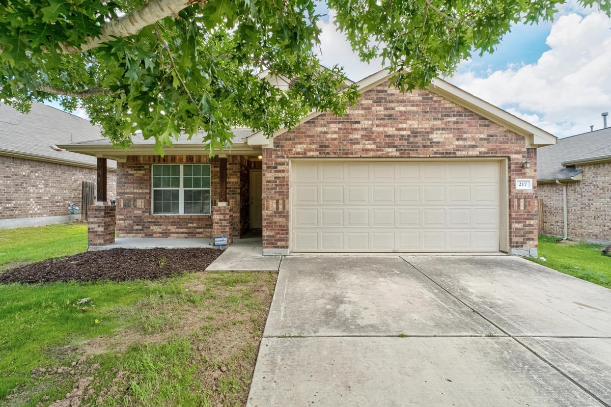 View 217 Strawberry Blonde DR in Sunfield Ph One Sec Two 217 Strawberry Blonde DR - front exterior - Luxury home in Sunfield Ph One Sec Two, Buda, TX