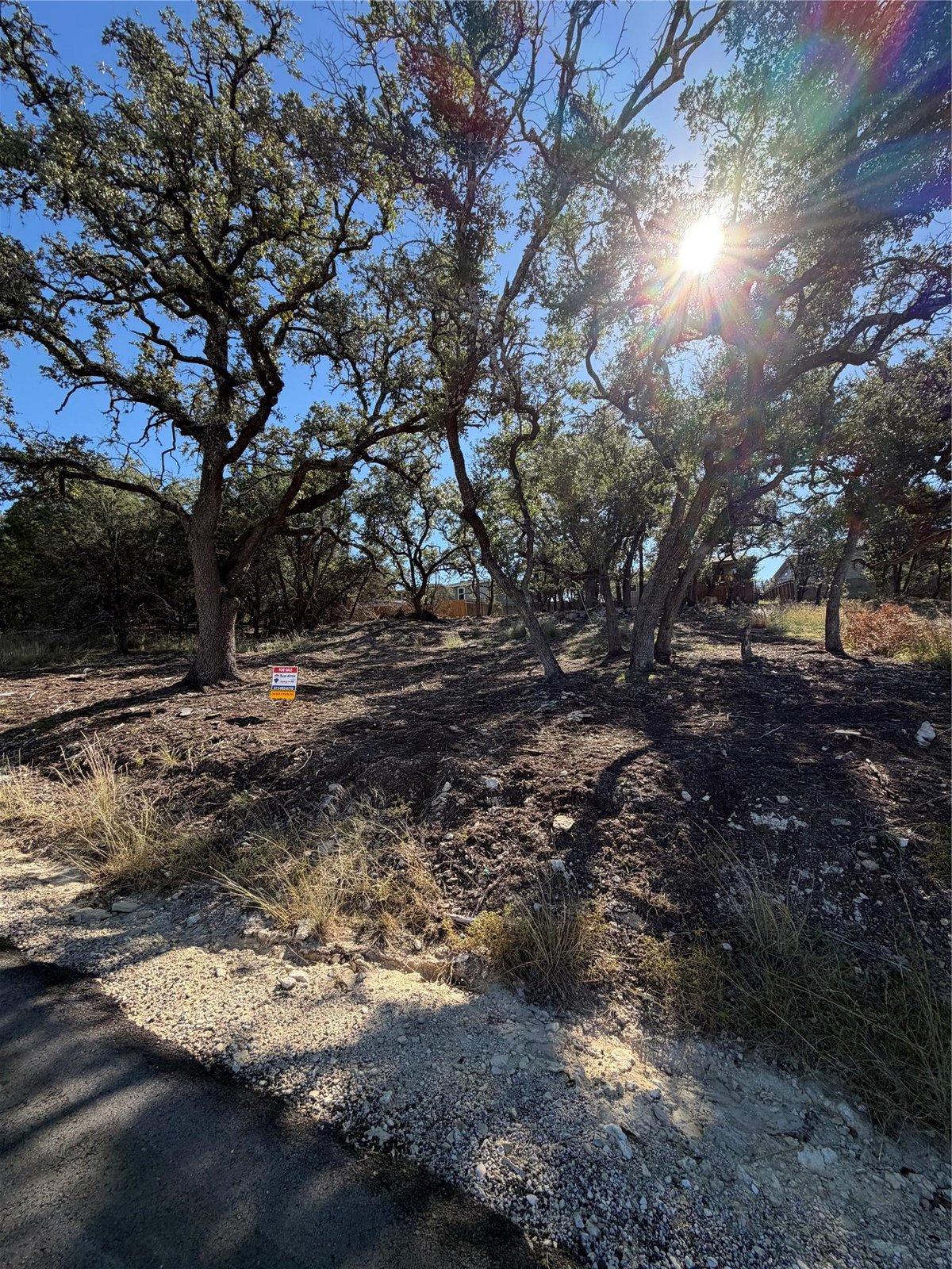 21801 McAllister Cir - front exterior - Luxury lot in Highland Lake Estates Sec 29, Lago Vista, TX