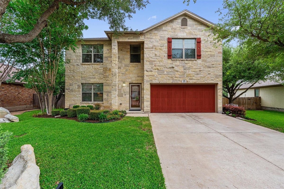 View 219 Wildwood Dr in Woodlake Ph 03 219 Wildwood Dr - front exterior - Luxury home in Woodlake Ph 03, Georgetown, TX