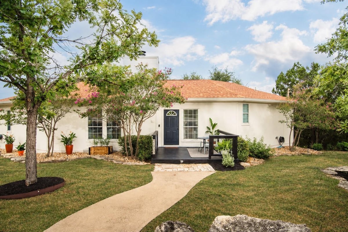 View 21900 Moulin DR in Briarcliff Inc Sec 14 21900 Moulin DR - front exterior - Luxury home in Briarcliff Inc Sec 14, Spicewood, TX