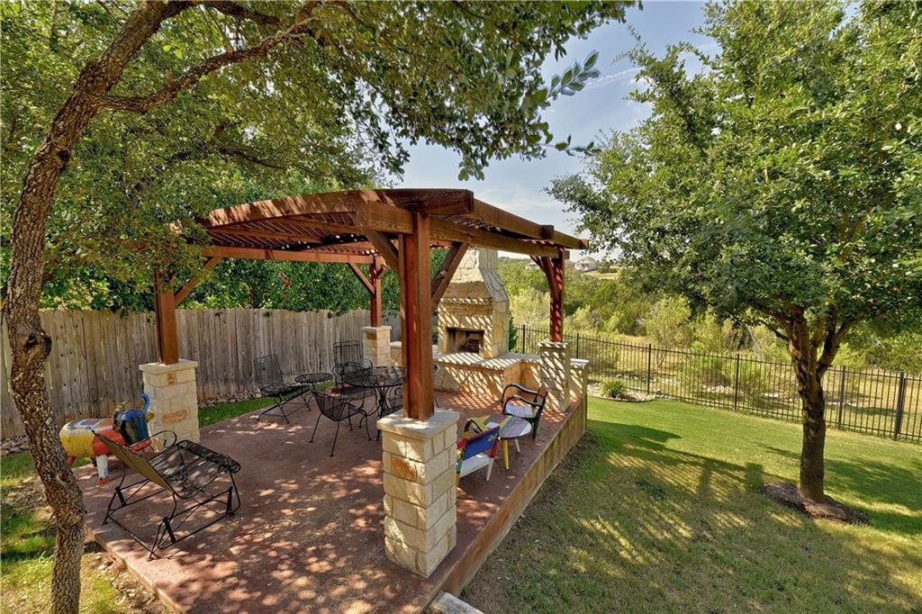 View 21908 Rock Wren RD 21908 Rock Wren RD - front exterior - Luxury home in Spicewood, TX