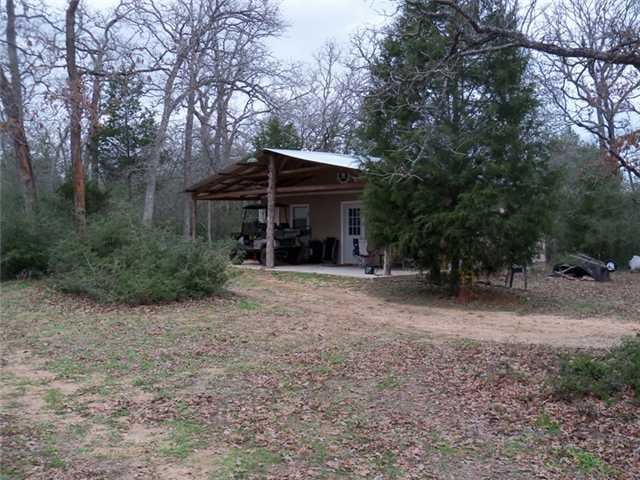 View 2195 County Rd. 413 2195 County Rd. 413 - front exterior - Luxury home in Lexington, TX