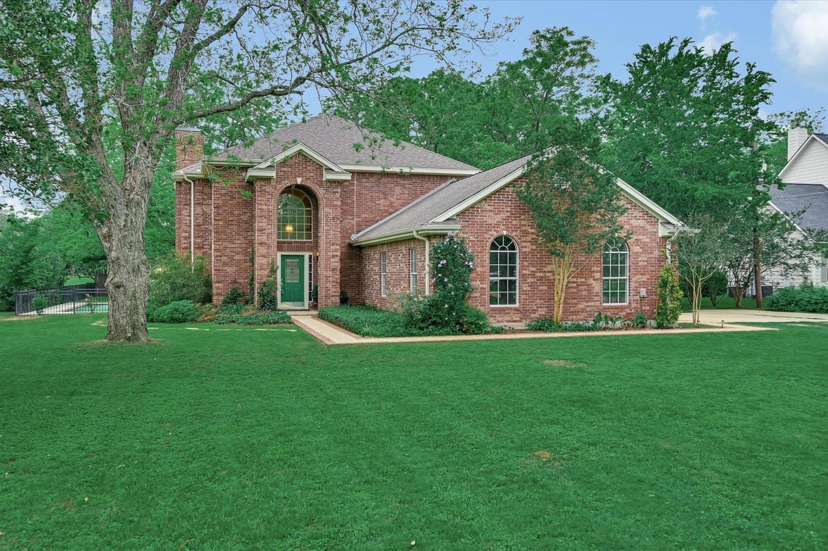 View 220 2 Mile Ln in Pecan Grove Bastrop Co 220 2 Mile Ln - front exterior - Luxury home in Pecan Grove Bastrop Co, Smithville, TX