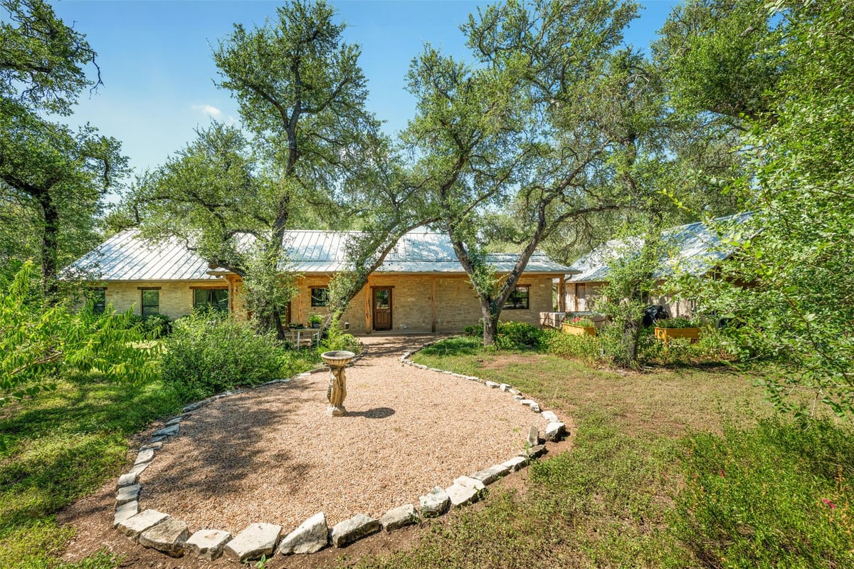 View 220 Meadowview DR in Saddleridge Sec 1 220 Meadowview DR - front exterior - Luxury home in Saddleridge Sec 1, Wimberley, TX
