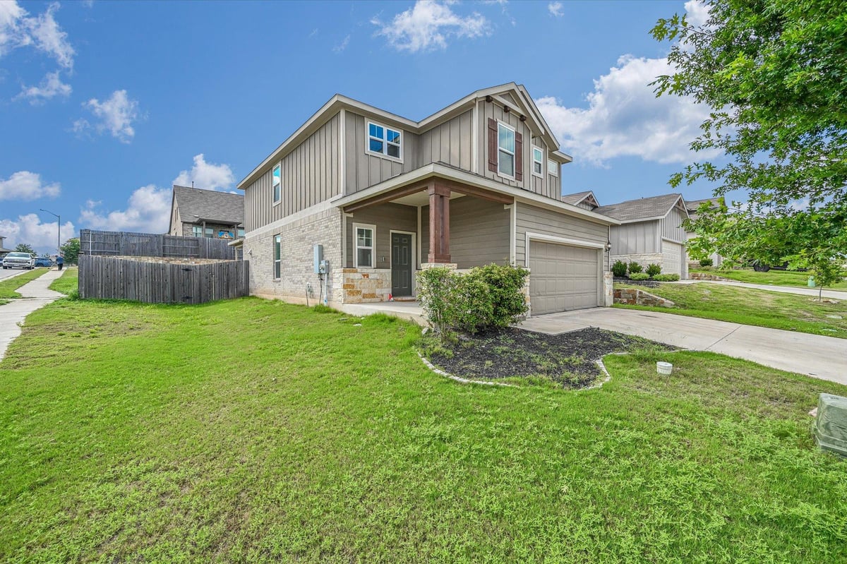 View 220 Nettletree DR in Sunfield Ph Four Sec One A 220 Nettletree DR - front exterior - Luxury home in Sunfield Ph Four Sec One A, Buda, TX