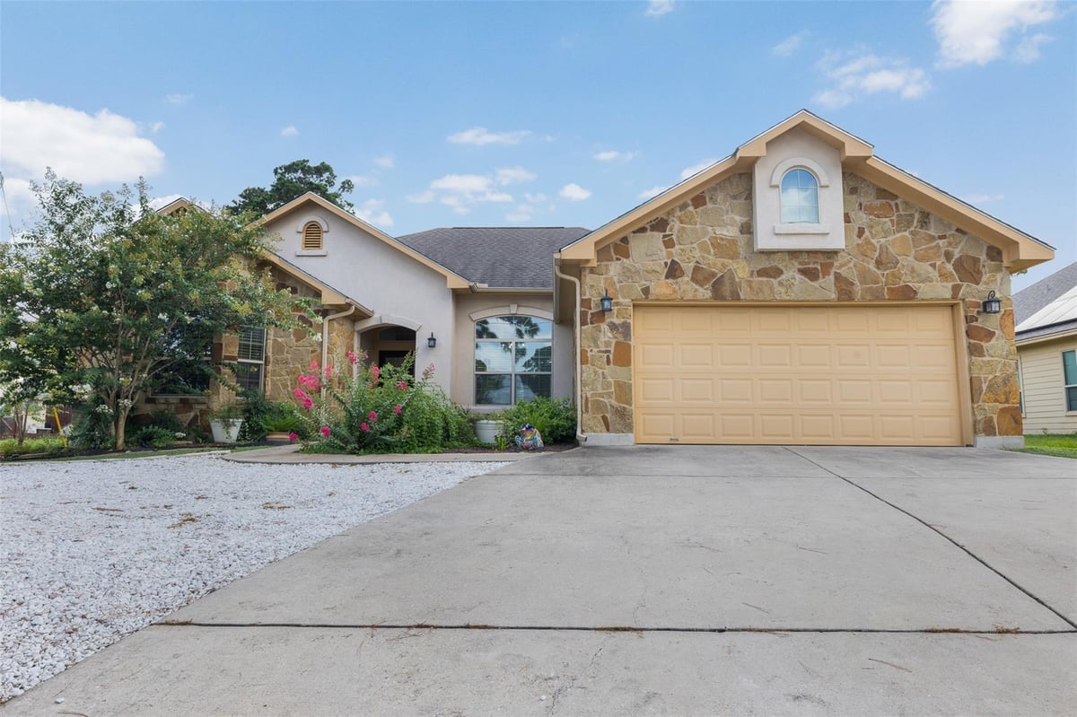 View 220 Tahitian DR in Tahitian Village 220 Tahitian DR - property photo 1 - Luxury home in Tahitian Village, Bastrop, TX