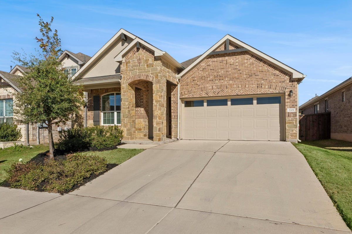 View 2201 Bobtail Pass in Bar W Ranch 2201 Bobtail Pass - front exterior - Luxury home in Bar W Ranch, Leander, TX