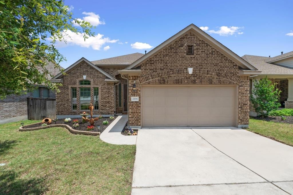 View 2204 Granite Hill Dr in Bluffs at Crystal Falls 2204 Granite Hill Dr - front exterior - Luxury home in Bluffs at Crystal Falls, Leander, TX