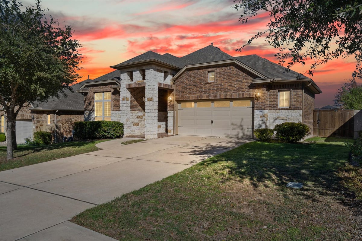 View 2204 Williston Loop in Bridges Of Bear Creek Ph 2 SE 2204 Williston Loop - front exterior - Luxury home in Bridges Of Bear Creek Ph 2 SE, Austin, TX