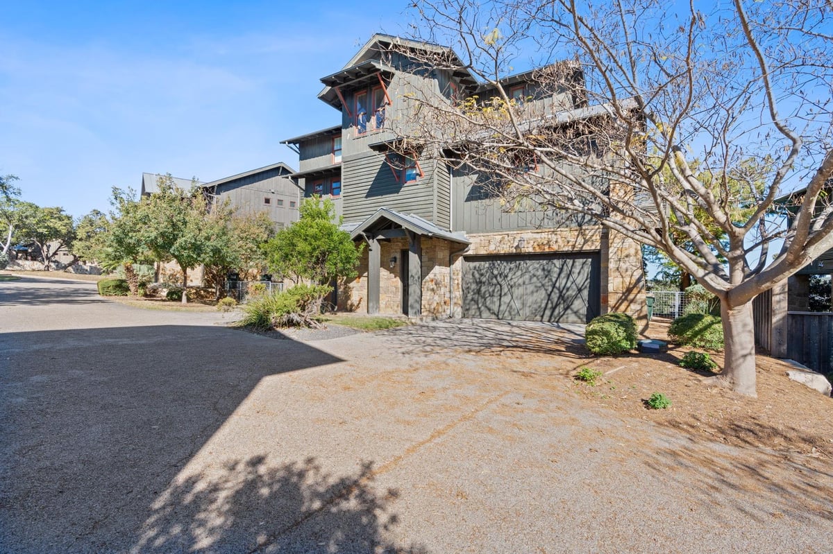 2208 Seabiscuit Cv Unit #133 - front exterior - Luxury home in Reserve at Lake Travis, Spicewood, TX