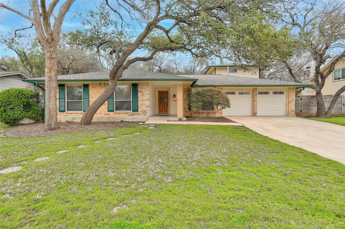 View 2209 Forest Bend DR in Horseshoe Bend 2209 Forest Bend DR - front exterior - Luxury home in Horseshoe Bend, Austin, TX