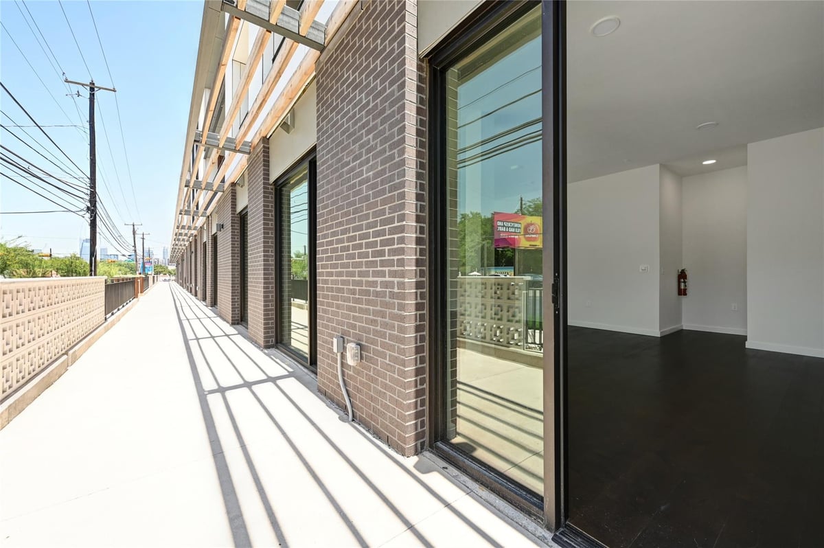 View 2209 S 1st St Unit #107 in One Oak 2209 S 1st St Unit #107 - front exterior - Luxury home in One Oak, Austin, TX