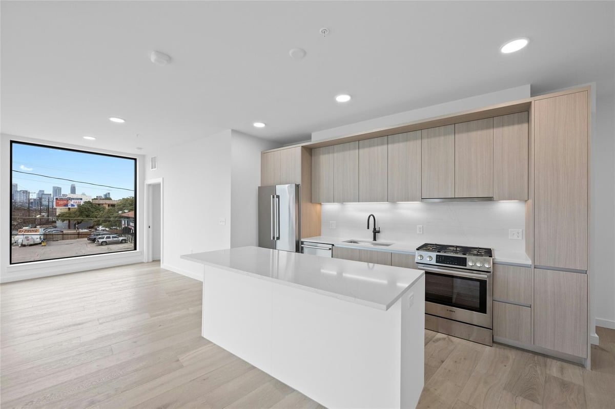 View 2209 S 1st ST Unit #210 in One Oak Condominiums 2209 S 1st ST Unit #210 - property photo 1 - Luxury home in One Oak Condominiums, Austin, TX
