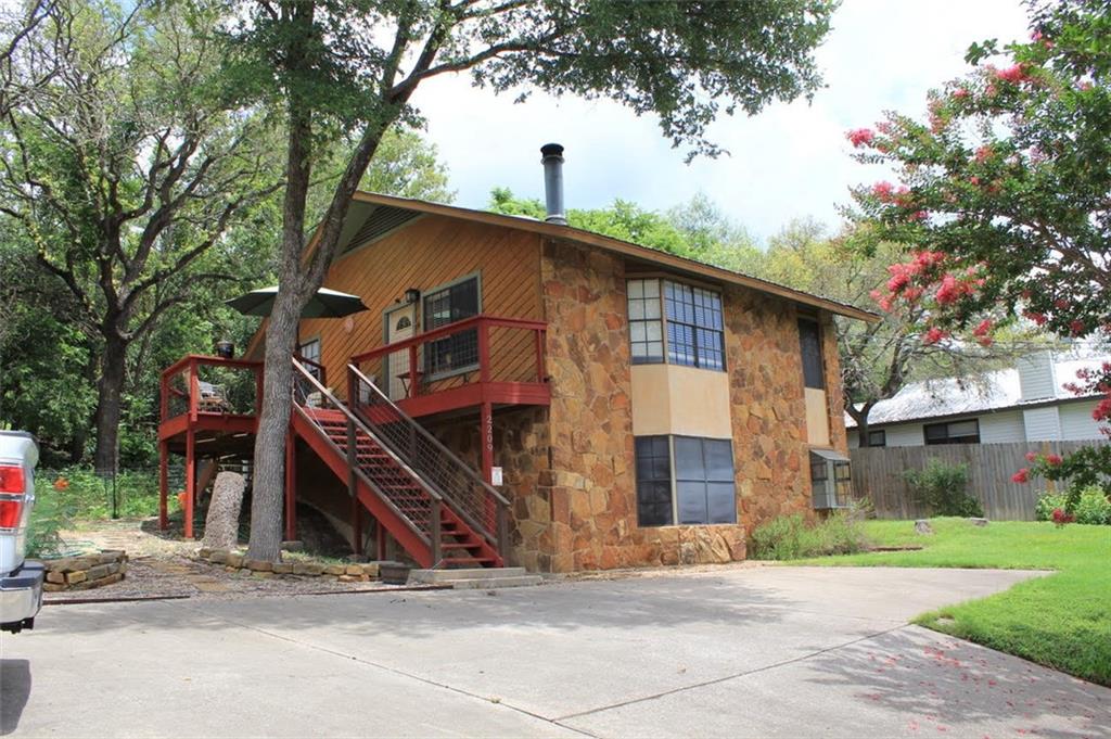 View 2209 Saratoga DR in Austin Lake Estates Sec 02 2209 Saratoga DR - front exterior - Luxury home in Austin Lake Estates Sec 02, Austin, TX