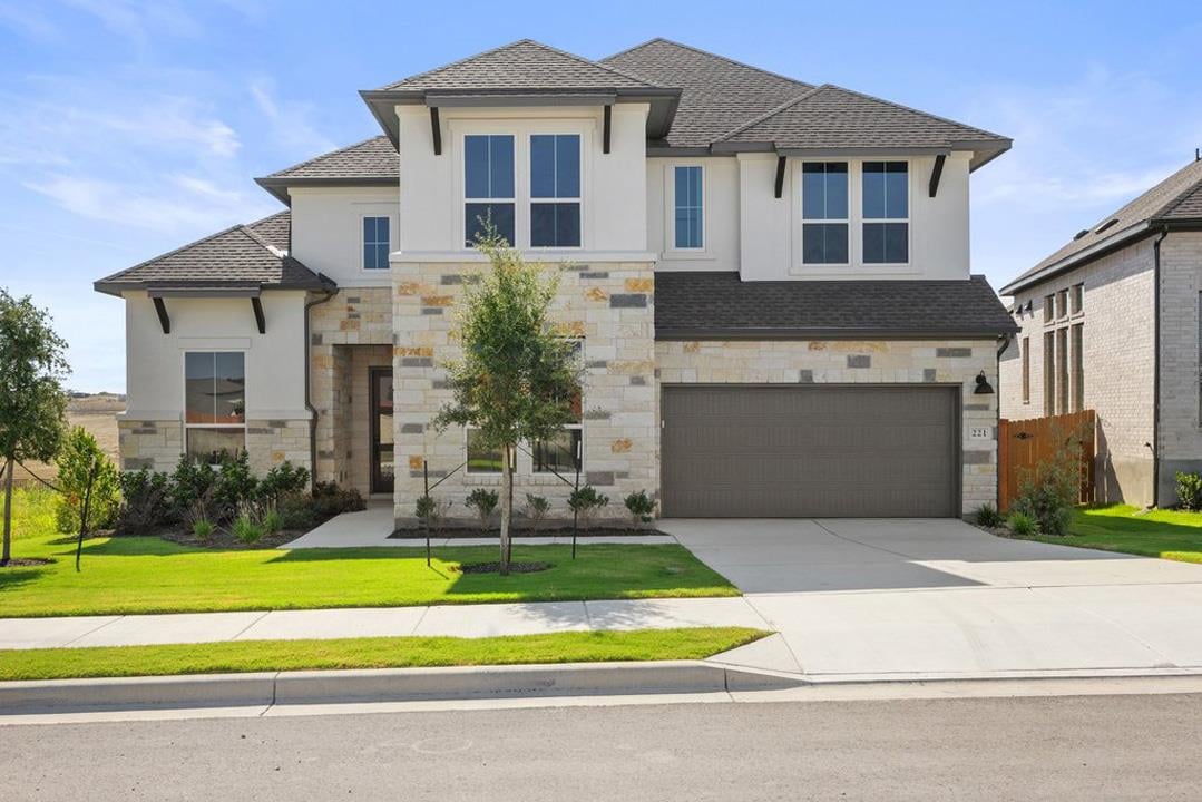 View 221 McMillian Drive in Lariat 221 McMillian Drive - front exterior - Luxury home in Lariat, Liberty Hill, TX