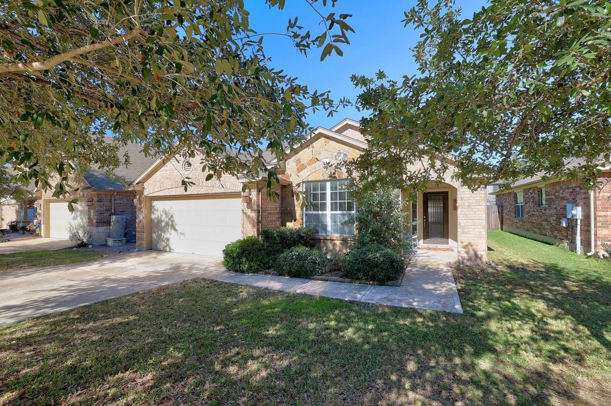 View 221 Mystic Holw in Whispering Hollow Ph I Sec 5C 221 Mystic Holw - property photo 1 - Luxury home in Whispering Hollow Ph I Sec 5C, Buda, TX