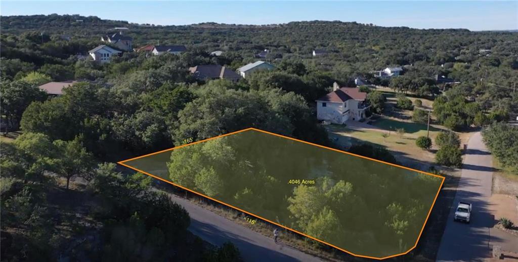 View 22100 Angus DR in Briarcliff Inc Sec 09 Amd 22100 Angus DR - property photo 1 - Luxury lot in Briarcliff Inc Sec 09 Amd, Spicewood, TX